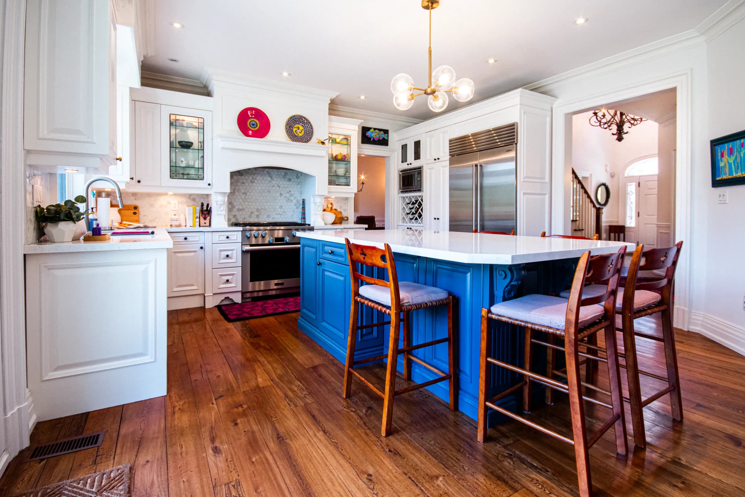 Chef's kitchen with a bold blue island